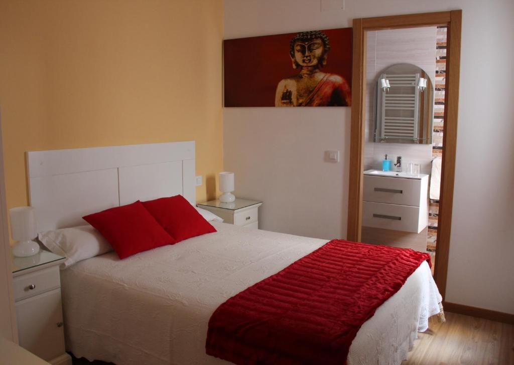 Postel nebo postele na pokoji v ubytování Casa de Huéspedes Galaica