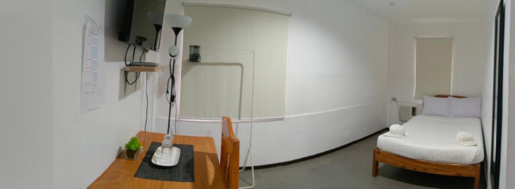Postel nebo postele na pokoji v ubytování Amor's Place