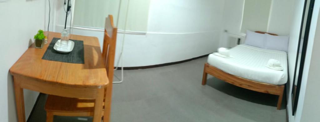 Postel nebo postele na pokoji v ubytování Amor's Place