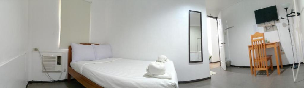 Postel nebo postele na pokoji v ubytování Amor's Place