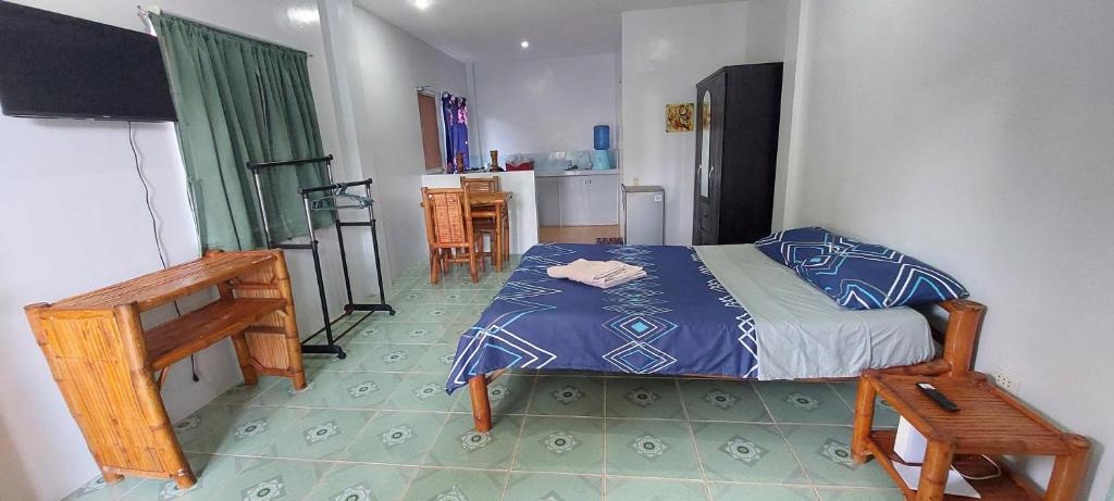Postel nebo postele na pokoji v ubytování Genna's Tourist Inn Santa Fe