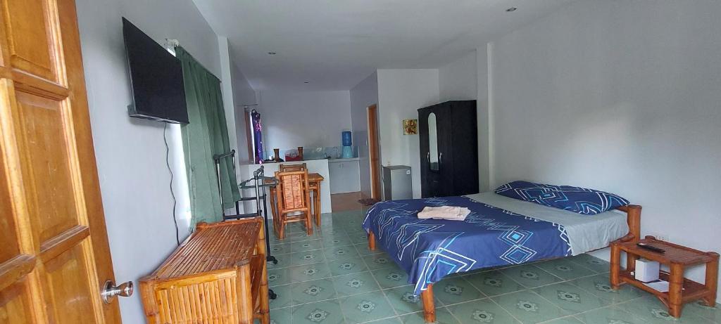 Postel nebo postele na pokoji v ubytování Genna's Tourist Inn Santa Fe
