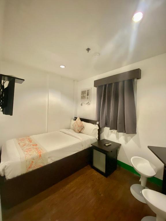 Postel nebo postele na pokoji v ubytování Emerald Bay Boracay