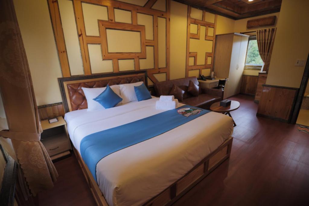 Voodi või voodid majutusasutuse Resort Hàng Dương toas