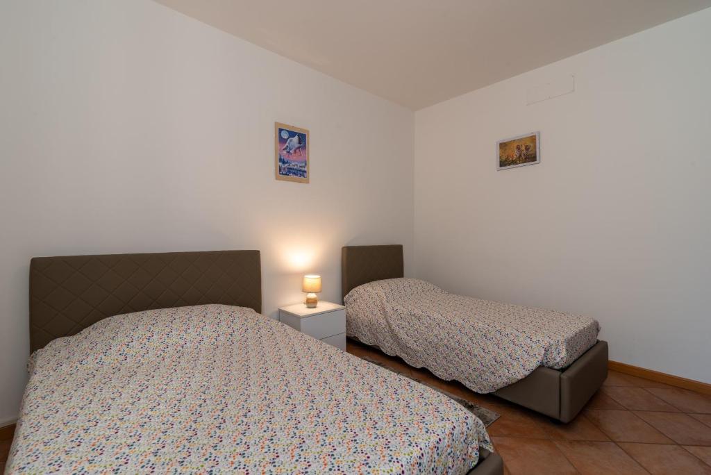 Postel nebo postele na pokoji v ubytování Casaentino