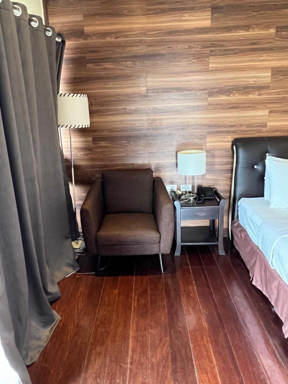 Postel nebo postele na pokoji v ubytování Lewiinski's Hotel