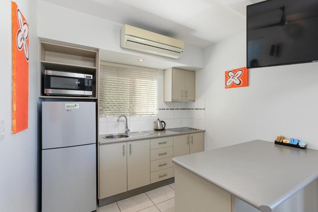 Kuchyň nebo kuchyňský kout v ubytování Waterview Airlie Beach