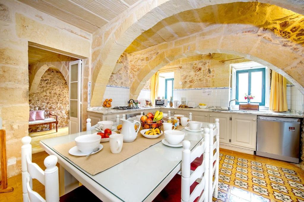 Kuchyň nebo kuchyňský kout v ubytování Gawhra Holiday Home