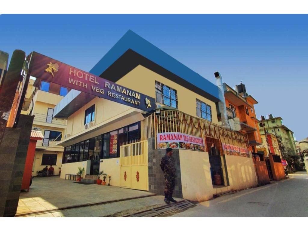 a man standing in front of a building at Hotel Ramanam in Kathmandu