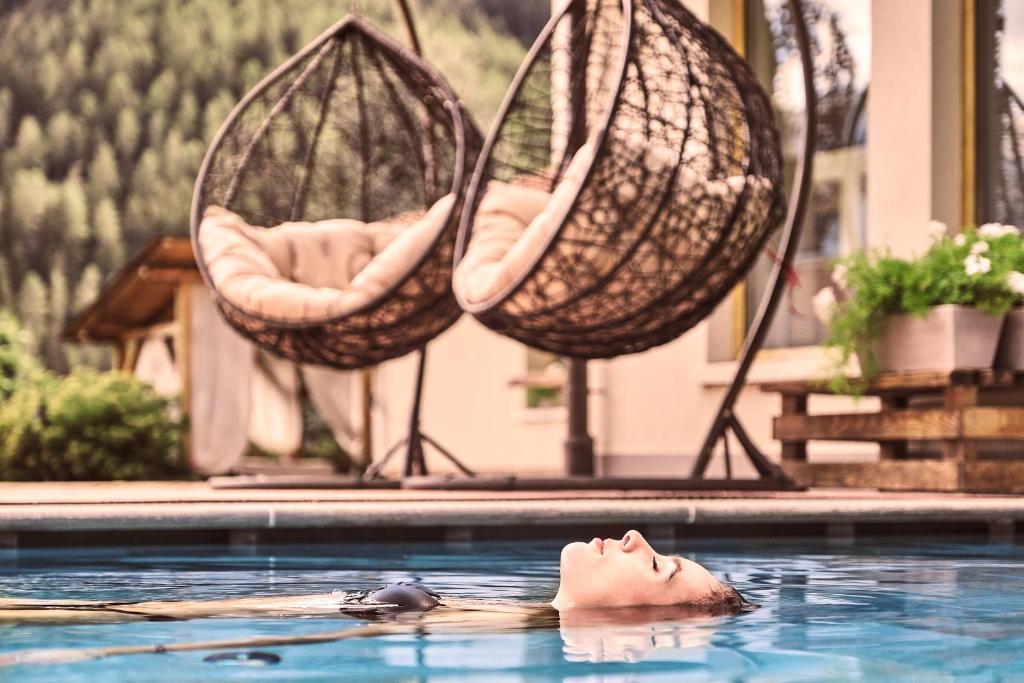 Bazén v ubytování Boutique Hotel e Chalets Salvadori nebo v jeho okolí