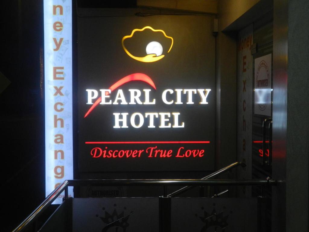 Certifikát, hodnocení, plakát nebo jiný dokument vystavený v ubytování Pearl City Hotel