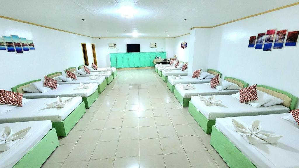 Postel nebo postele na pokoji v ubytování Demiren Hotel