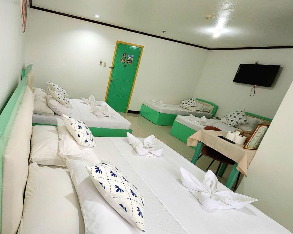 Postel nebo postele na pokoji v ubytování Demiren Hotel