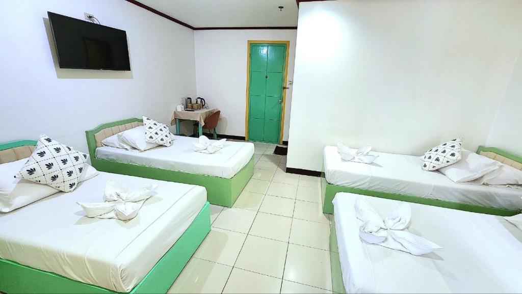 Postel nebo postele na pokoji v ubytování Demiren Hotel