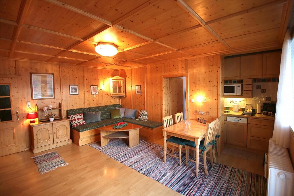 a kitchen with a couch and a table in a room at Apartment Bebette - 1 Bedroom- Austrian Alpine Getaways in Winklerdörfl