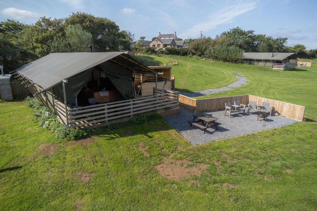 an overhead view of a tent in a field at Burryholmes - Safari Glamping Tent - Llangennith in Llangennith