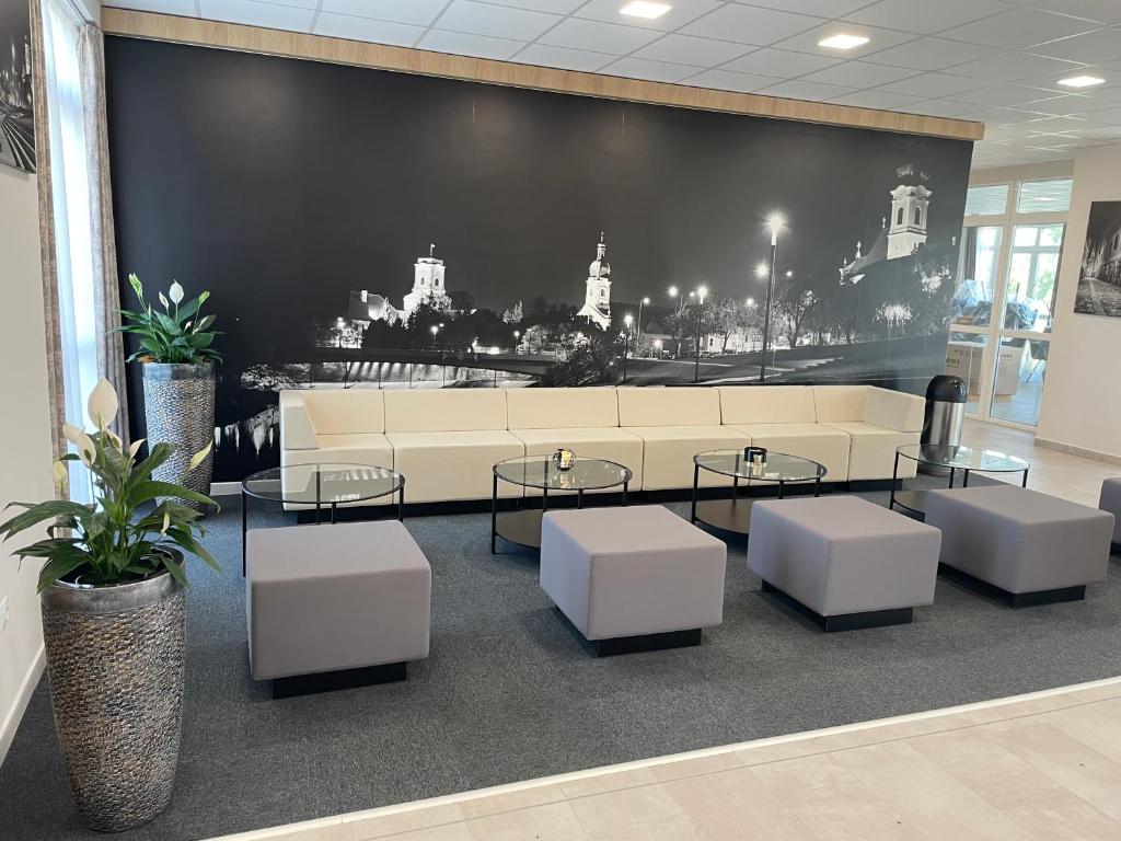 Posedenie v ubytovaní Gyirmót Sport & Wellness Hotel