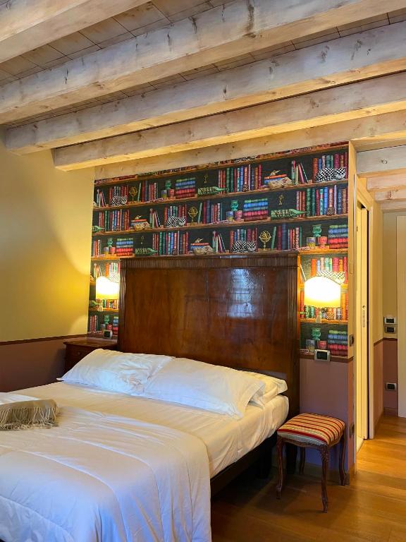 Postel nebo postele na pokoji v ubytování Locanda Lo Scudo