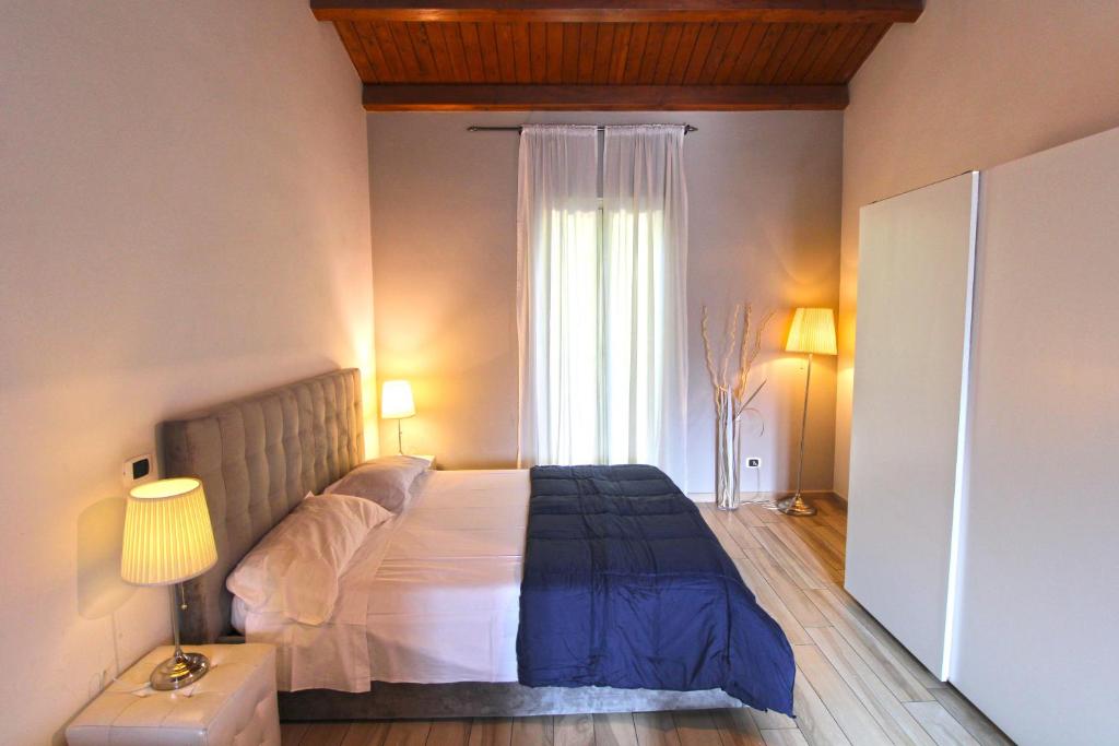 Postel nebo postele na pokoji v ubytování Dalmati House San Lorenzo