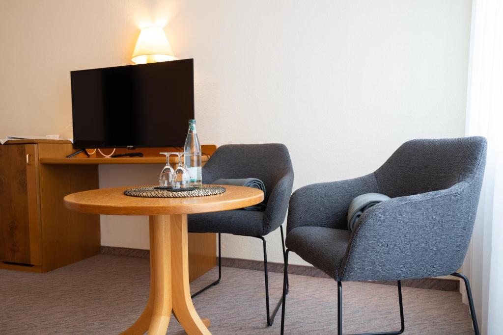 TV a/nebo společenská místnost v ubytování Hotel Suggenbad