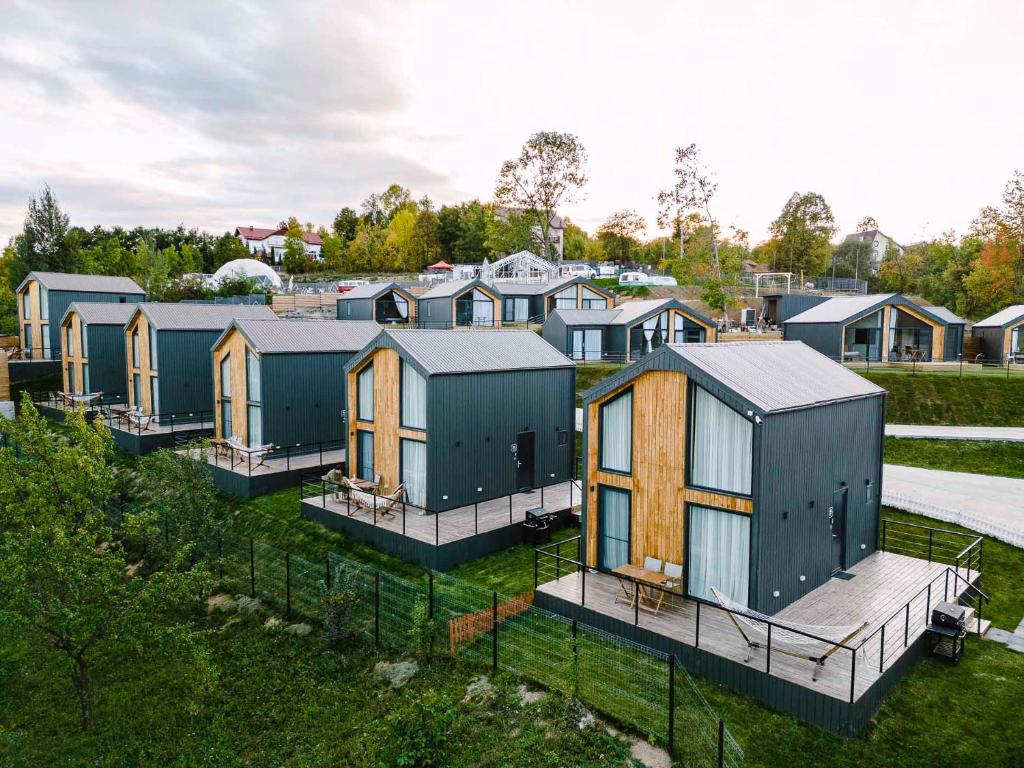 an aerial view of a row of houses at Moon Village Comarnic in Sinaia