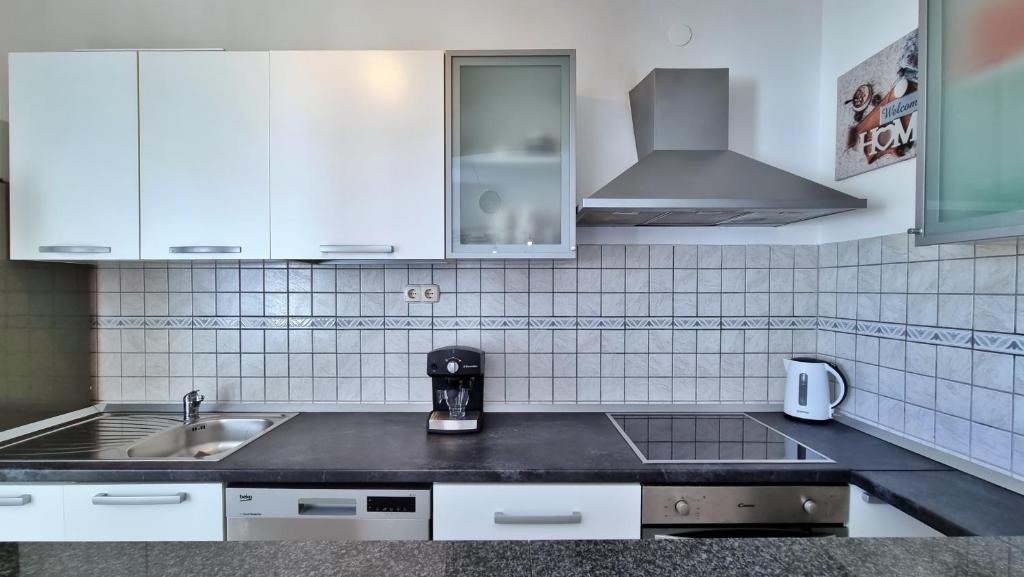 Kuchyňa alebo kuchynka v ubytovaní Apartments Slado