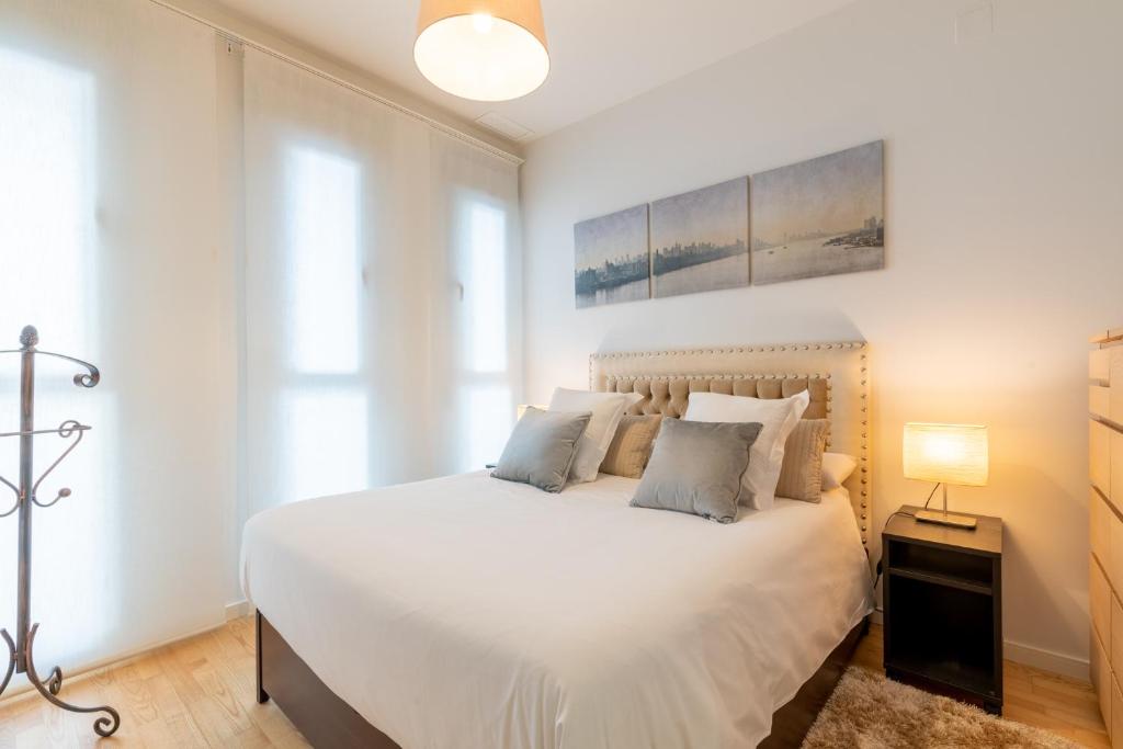 Łóżko lub łóżka w pokoju w obiekcie Veoapartment Rastro