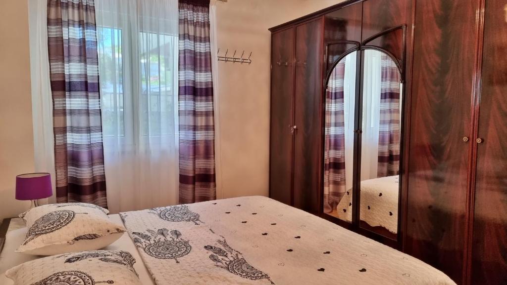 Posteľ alebo postele v izbe v ubytovaní Apartments Slado
