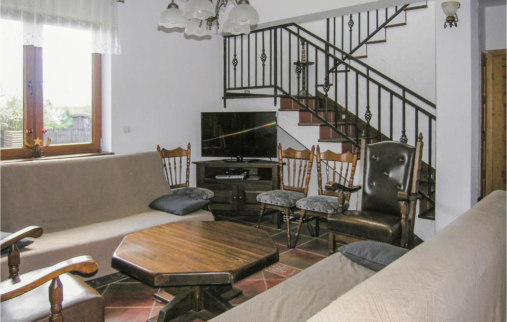 Posedenie v ubytovaní Holiday Home Jedwabno With Fireplace I