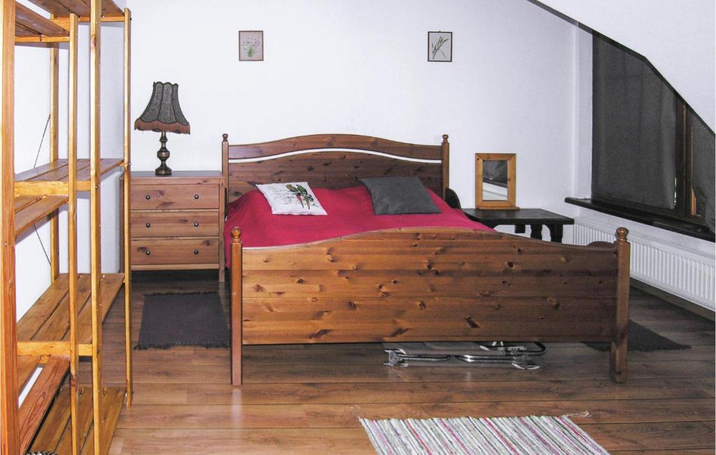 Posteľ alebo postele v izbe v ubytovaní Holiday Home Jedwabno With Fireplace I
