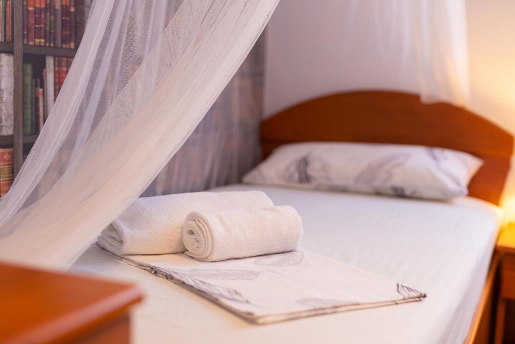 Postel nebo postele na pokoji v ubytování Apartman BOR Krk