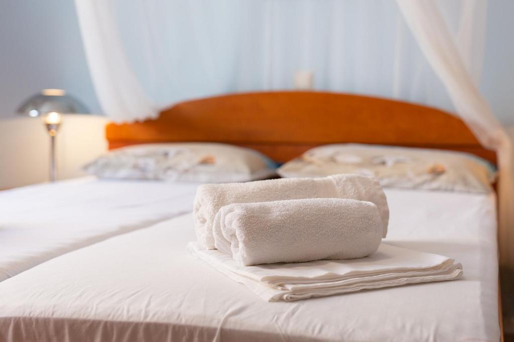 Postel nebo postele na pokoji v ubytování Apartman BOR Krk