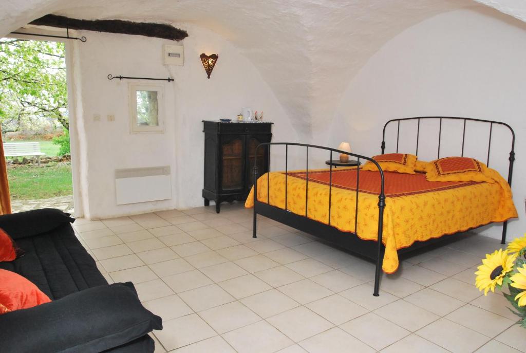 Postel nebo postele na pokoji v ubytování Chez Bacchus