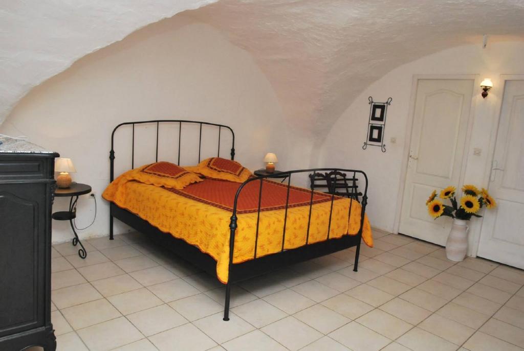 Postel nebo postele na pokoji v ubytování Chez Bacchus