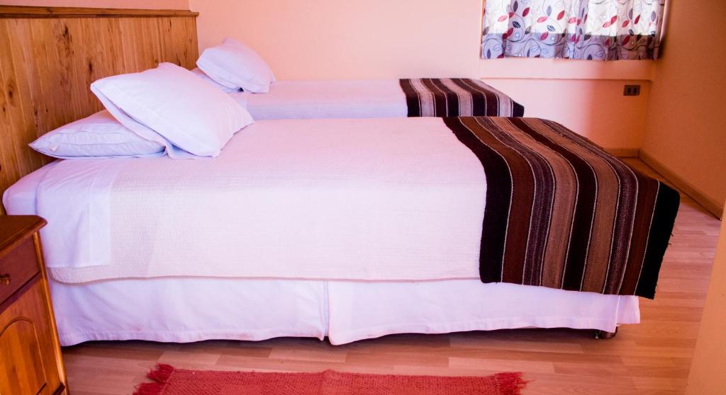 Postel nebo postele na pokoji v ubytování Hotel Iorana Tolache