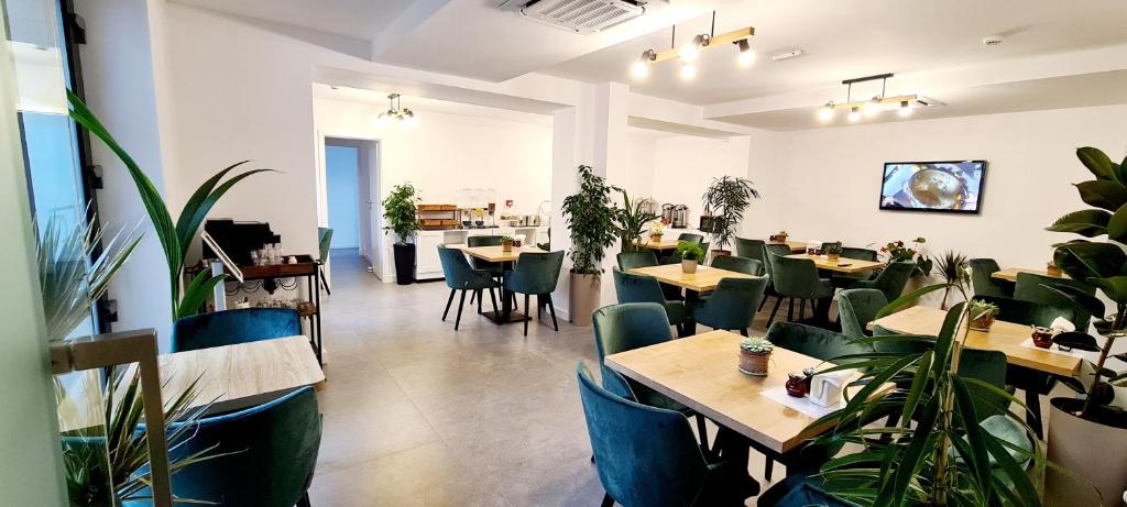 TV a/nebo společenská místnost v ubytování Hotel B4