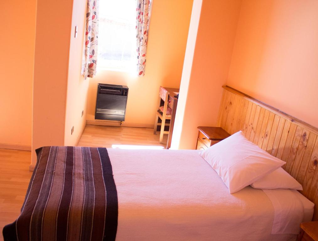 Postel nebo postele na pokoji v ubytování Hotel Iorana Tolache