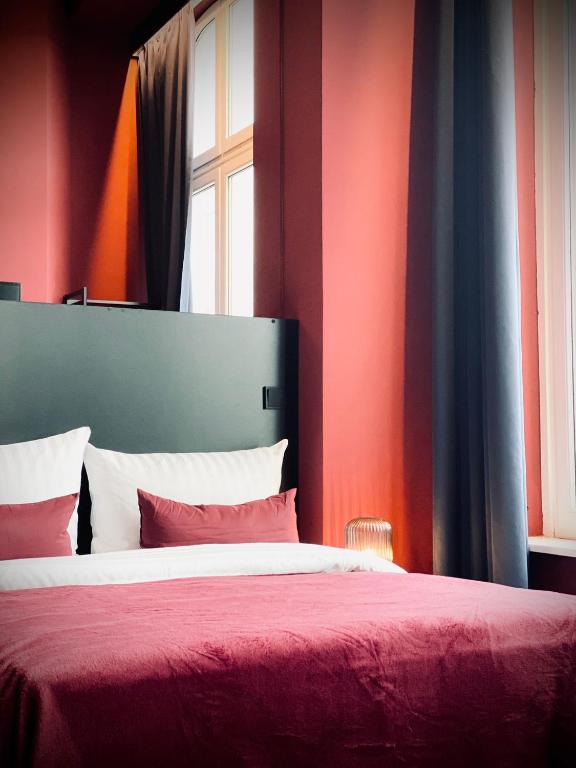 Postel nebo postele na pokoji v ubytování Sleephotels Casino