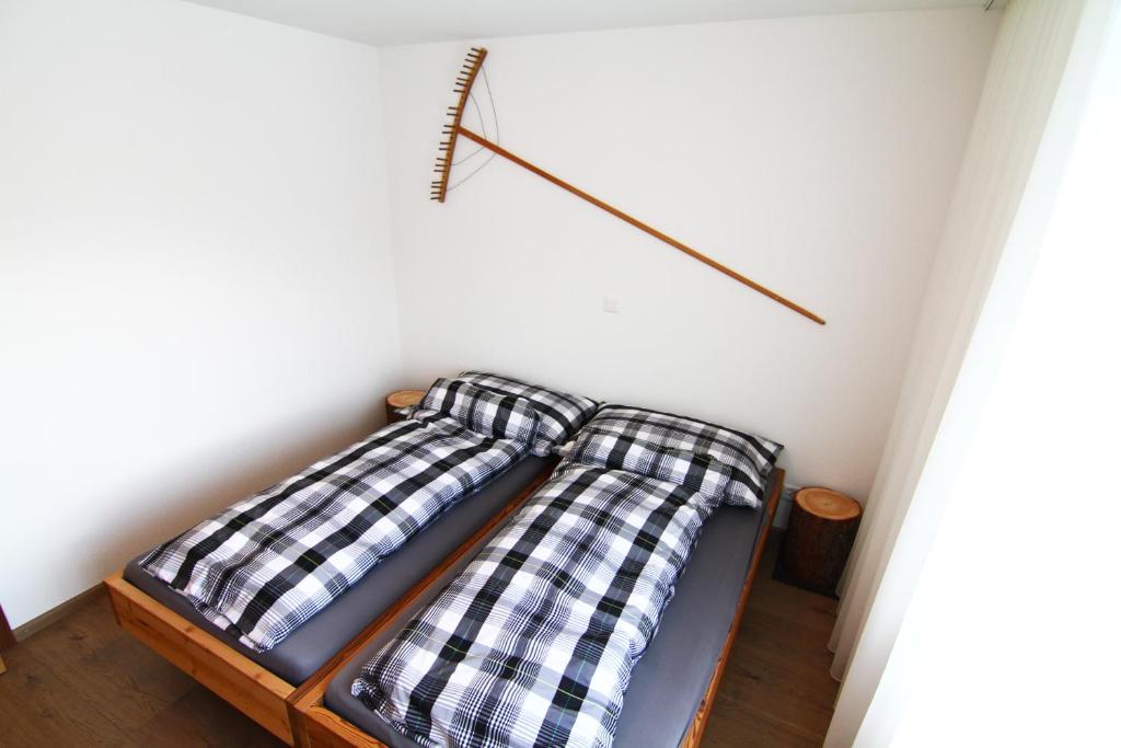 Postel nebo postele na pokoji v ubytování Amor Lodge