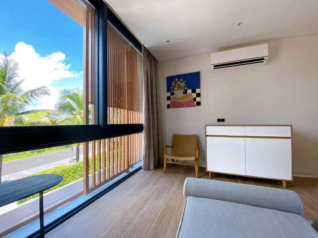 Balkón nebo terasa v ubytování Phoenix Pool Villa Phu Quoc