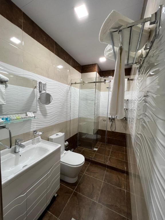 Koupelna v ubytování Ada Hotel