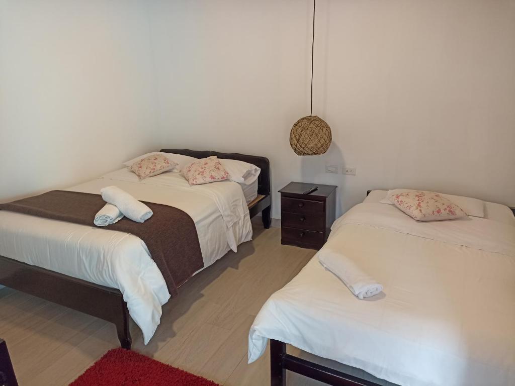 Postel nebo postele na pokoji v ubytování Posada J