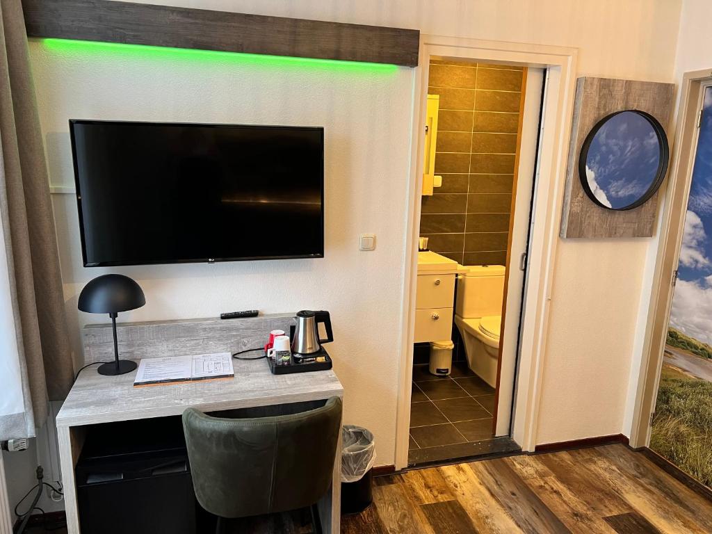 Kuchyň nebo kuchyňský kout v ubytování Hotel Nap