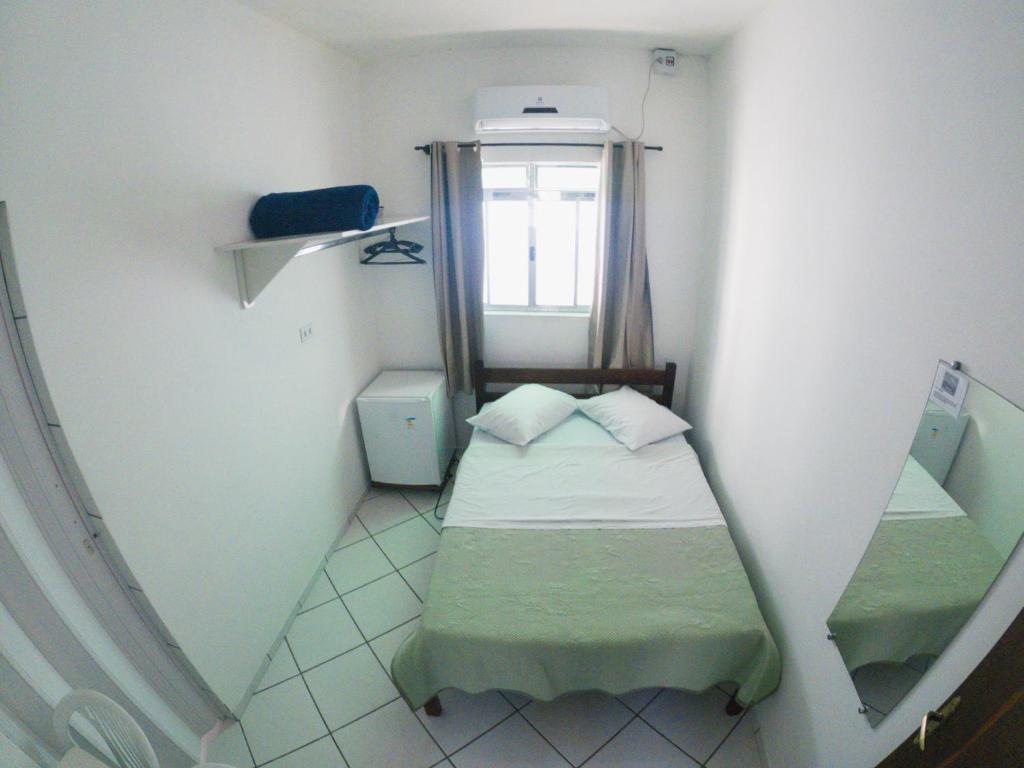 Postel nebo postele na pokoji v ubytování HOTEL MORADA DO SOL