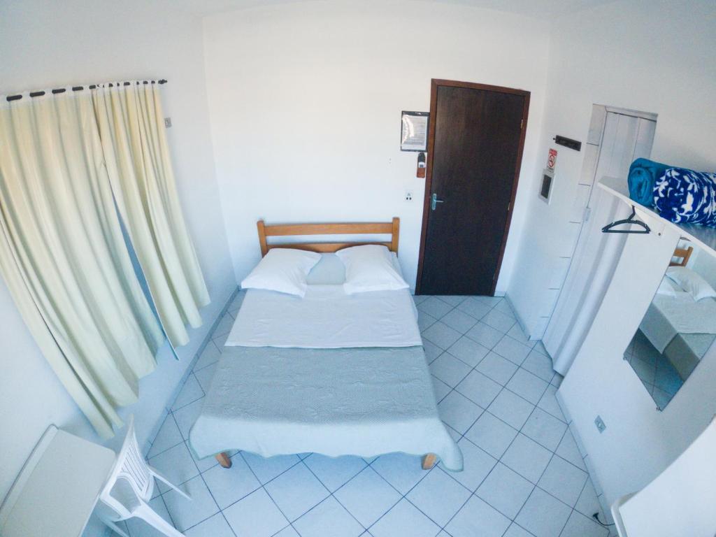 Postel nebo postele na pokoji v ubytování HOTEL MORADA DO SOL