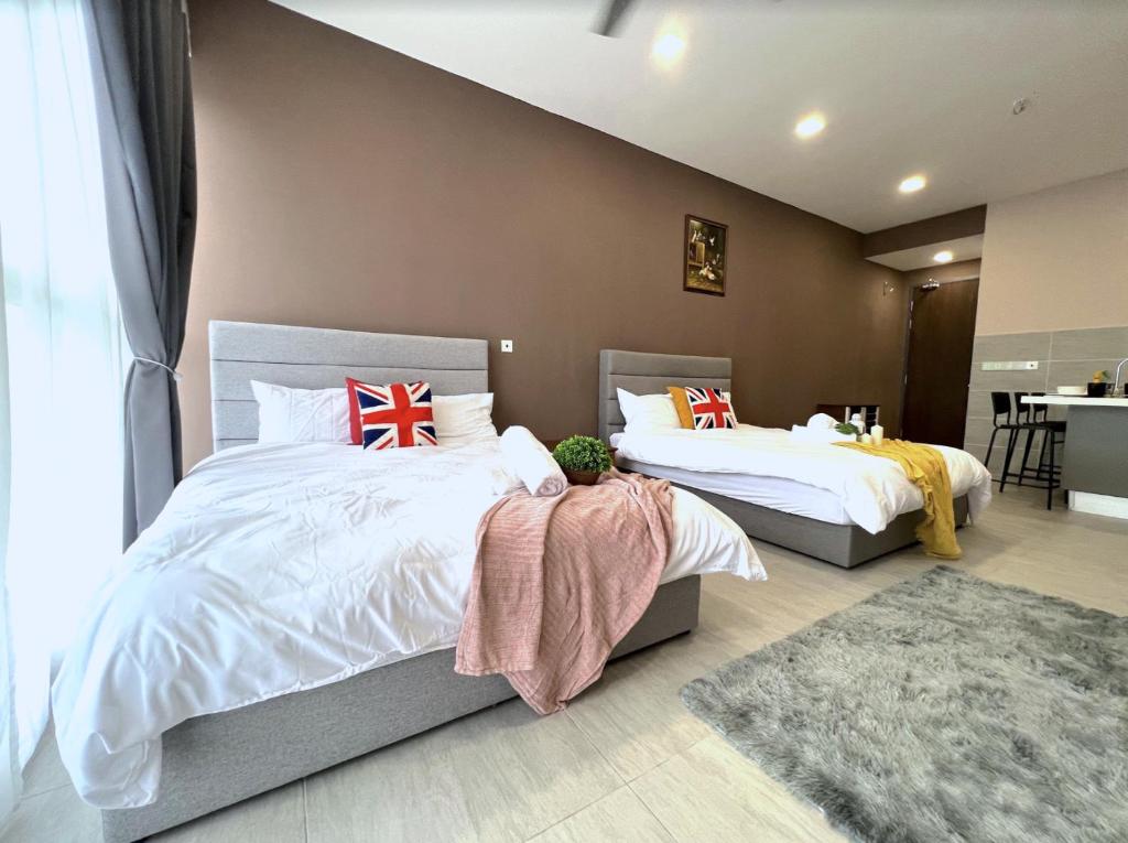 Giường trong phòng chung tại FREE PARKING # 2 Bed Family BellSuite - Sepang KLIA Kota Warisan