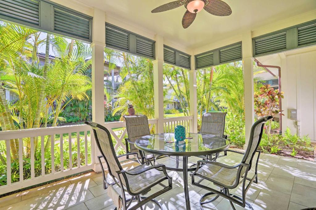 a patio with a table and chairs on a balcony at Coastal Ko Olina Townhome - Walk to Beaches! in Kapolei