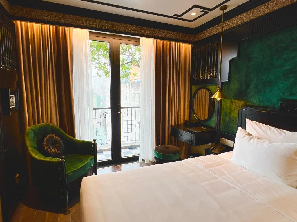 Postel nebo postele na pokoji v ubytování Hotel du Monde Classic