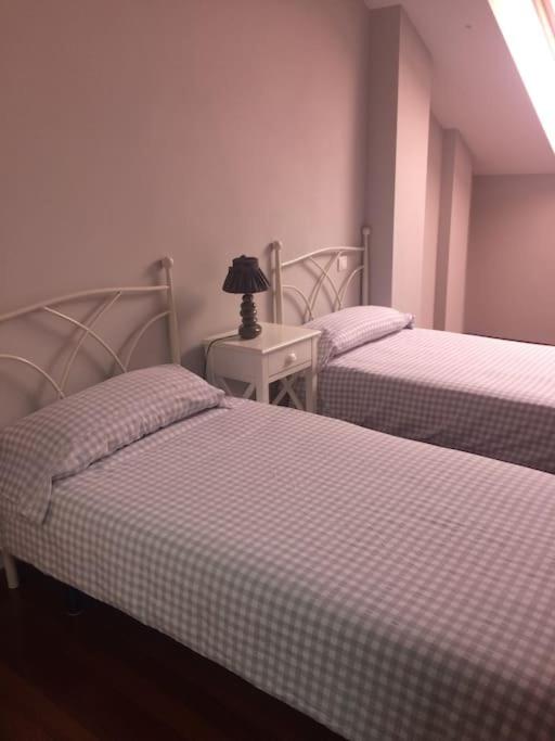 Postel nebo postele na pokoji v ubytování Martinelia