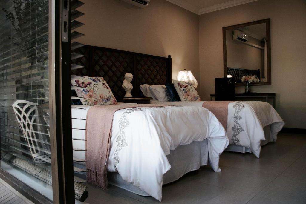 Postel nebo postele na pokoji v ubytování Mi Vida Guesthouse